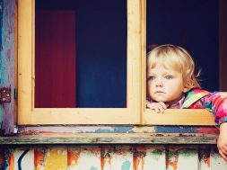child-at-window-joel-overbeck-unsplash.jpg