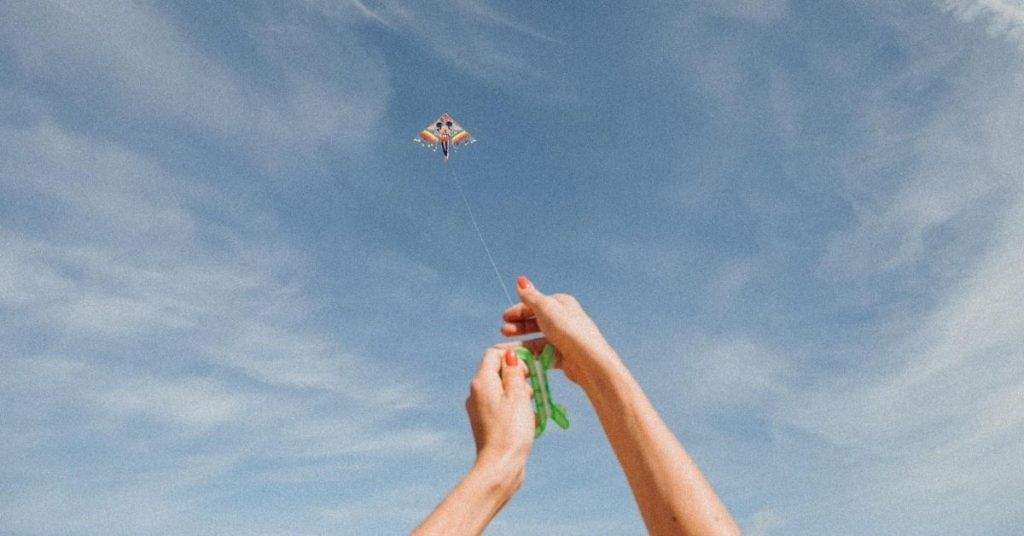 person flying a kite
