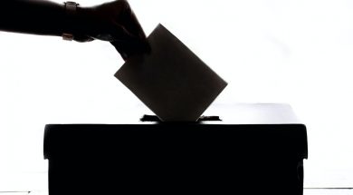 Putting-vote-in-ballot-box-by-Element5-Unsplash.jpg