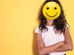 Woman-with-Smiley-Emoji-for-a-face.jpg