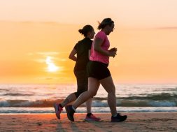 Two-women-running-on-beach.jpg