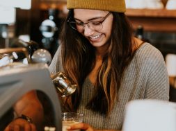 Young-woman-working-at-a-cafe.jpg